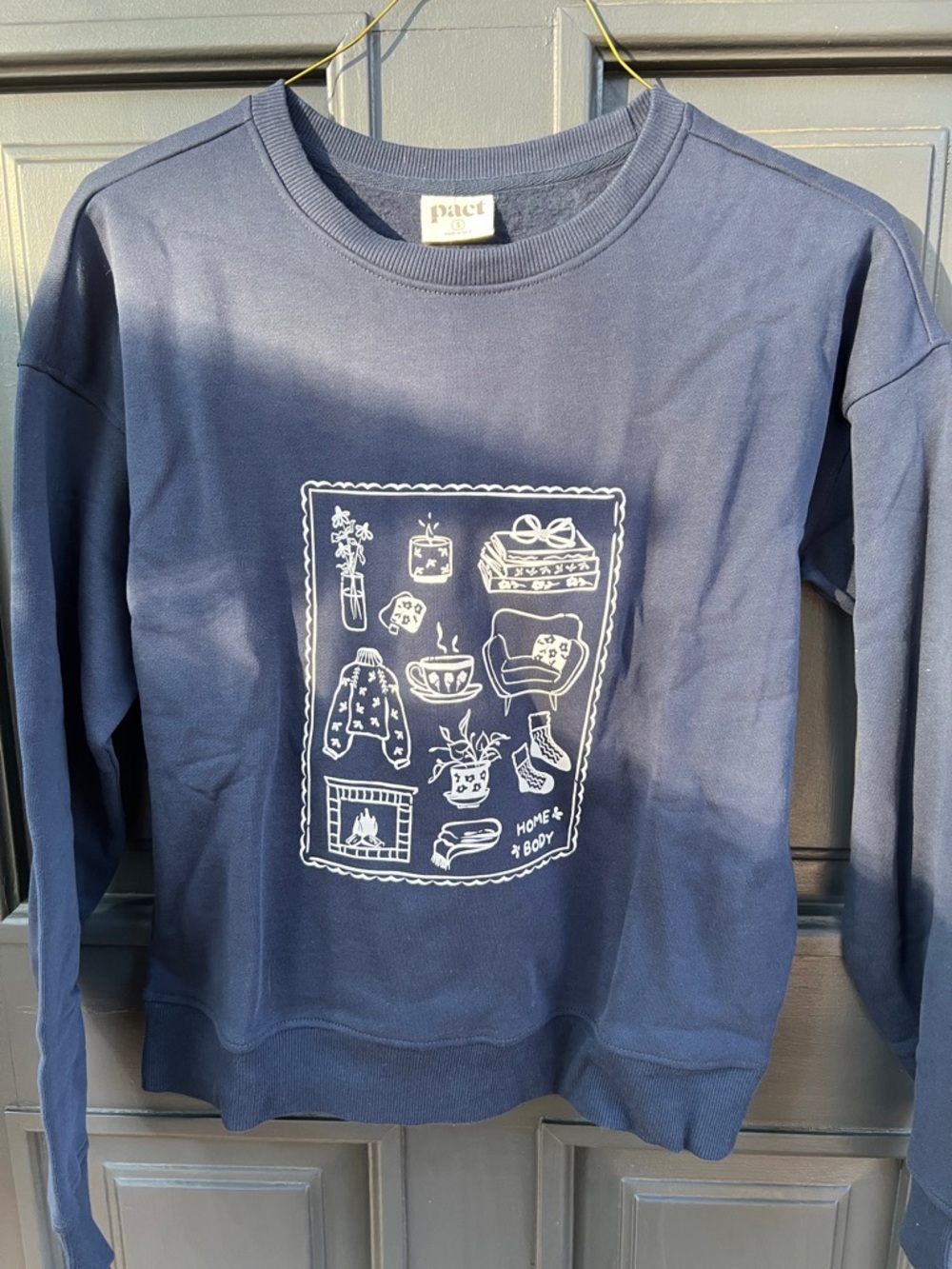 Pact Navy Blue Sweatshirt with White Home-Themed Graphic